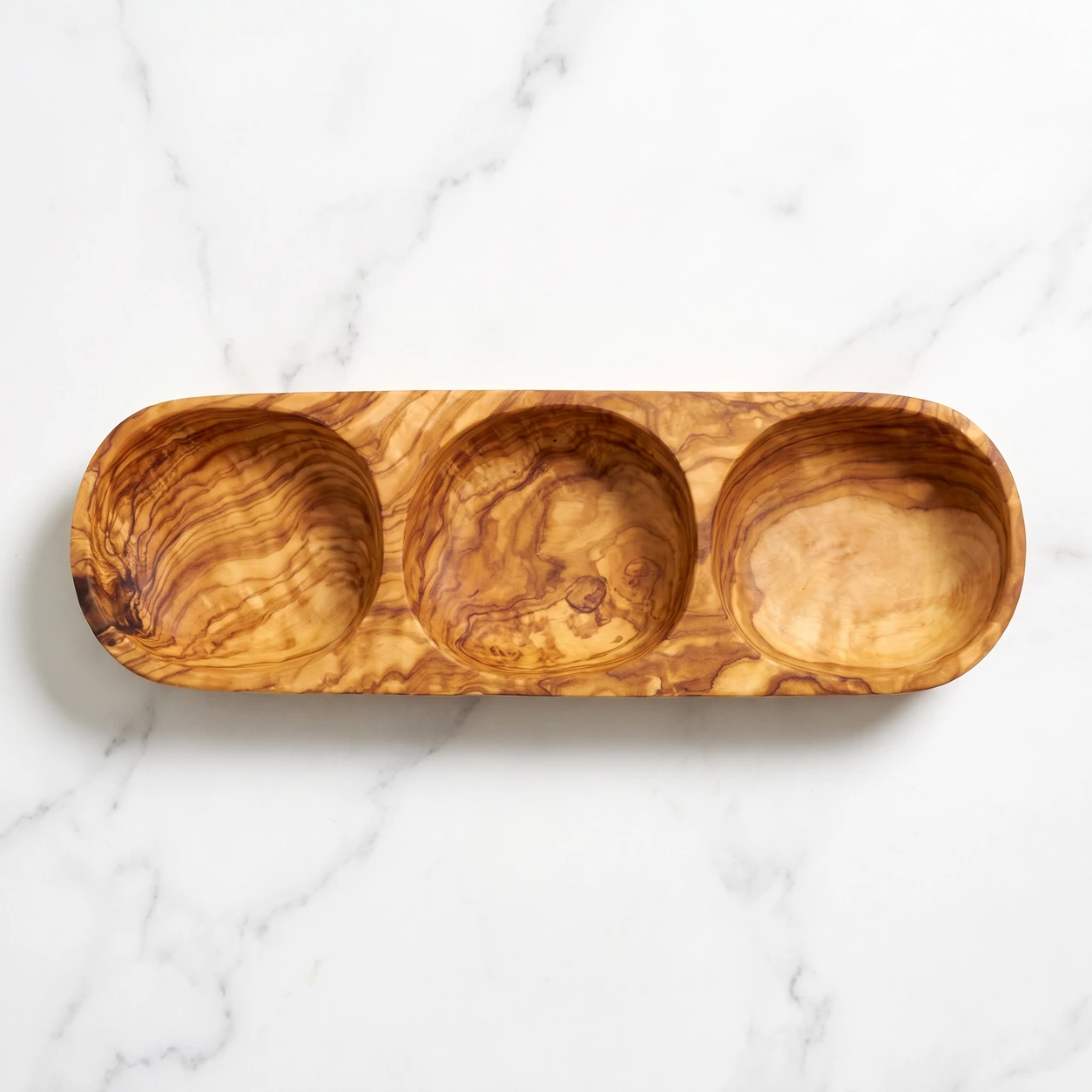 Three-section olive wood serving dish viewed from above