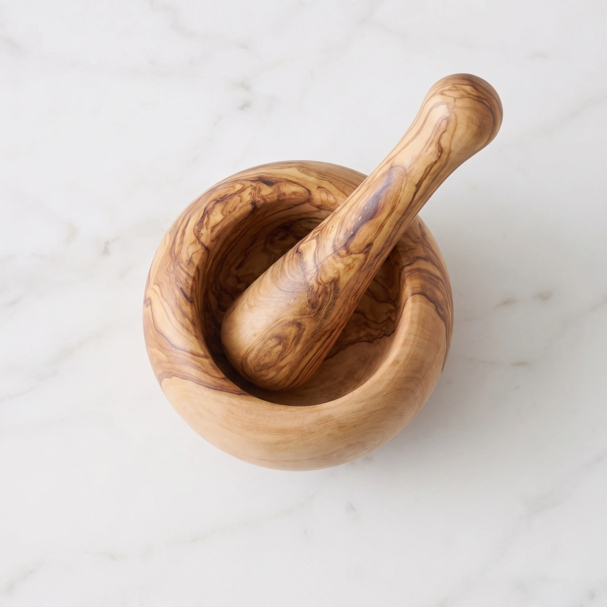 Top view of the olive wood mortar and pestle