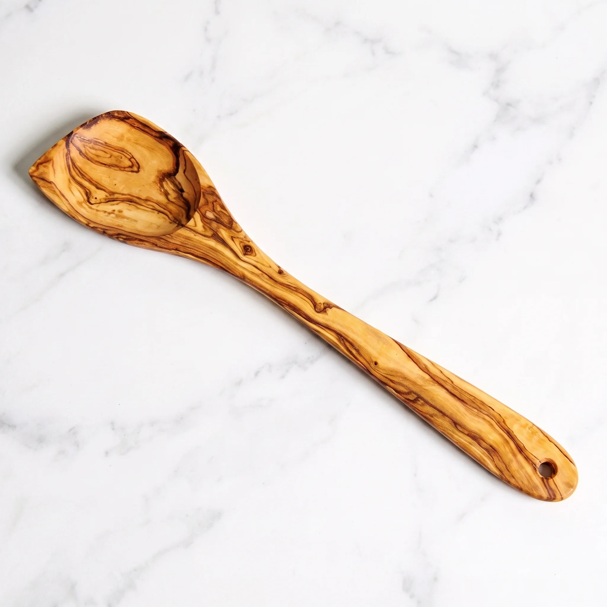 Olive wood mixing spoon viewed from above